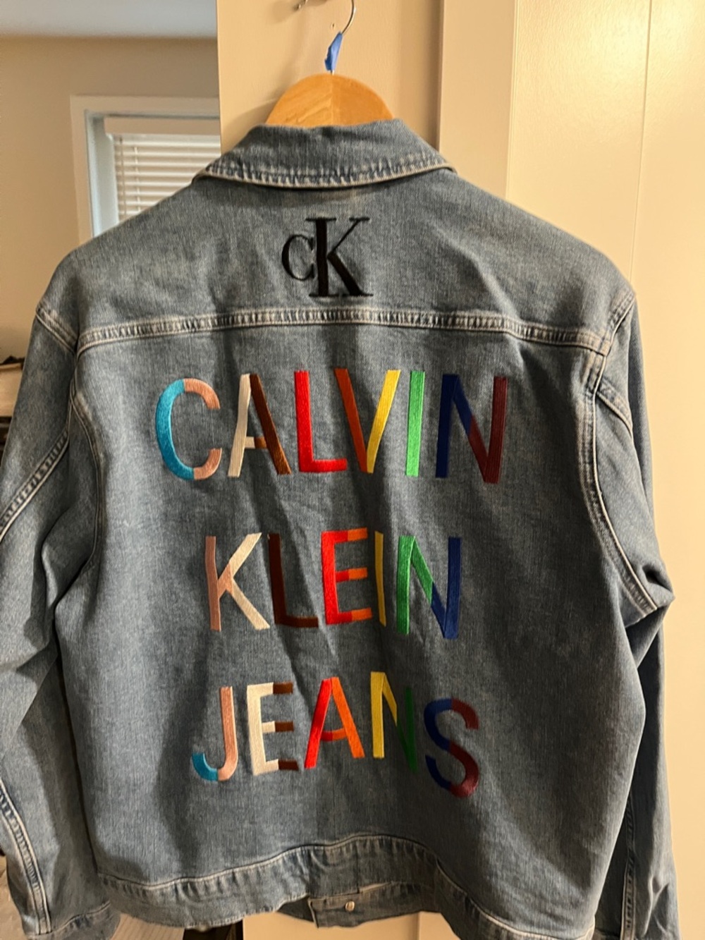 Rare and UNIQUE Calvin Klein Medium Wash Blue Denim Rainbow Logo Jacket.EUC